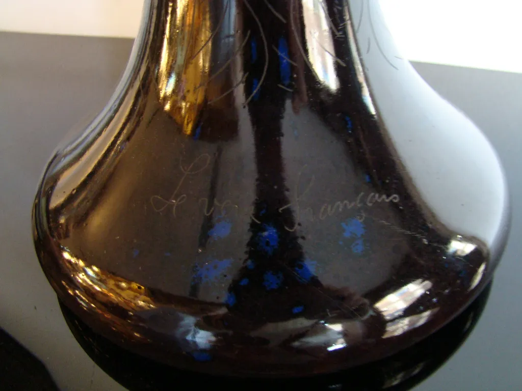 Antique signed glass Charder with blue details.