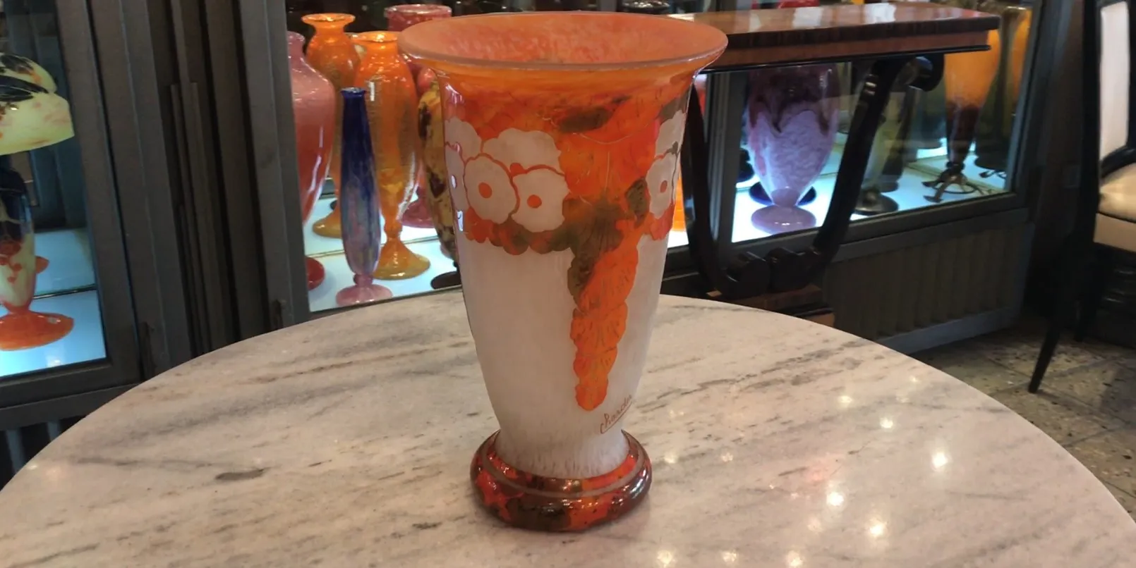 Antique with floral design and bright colors, signed glass.