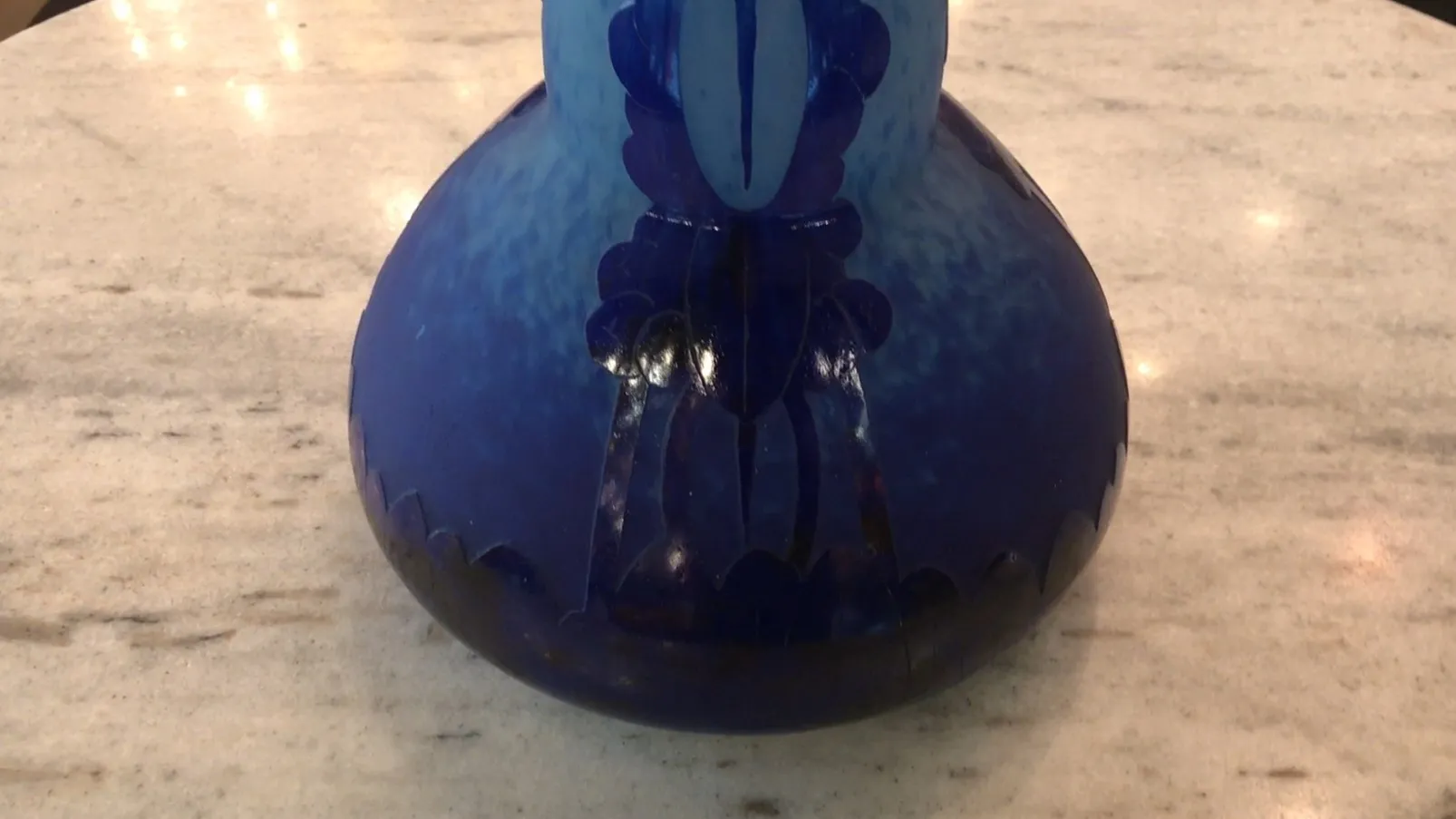 Antique signed glass Charder with decorative blue design on a neutral background.