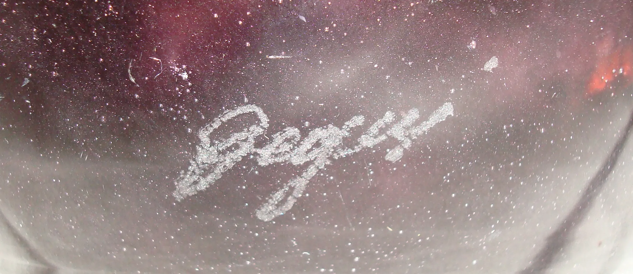 Signed glass Degué with unique texture and subtle details, antique setting.