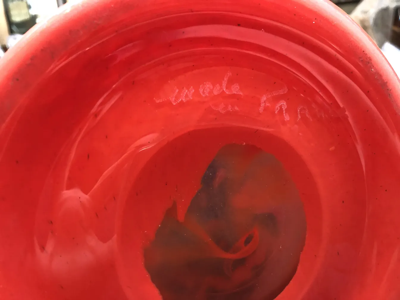 Antique signed glass Degué with red details, elegant and distinctive.