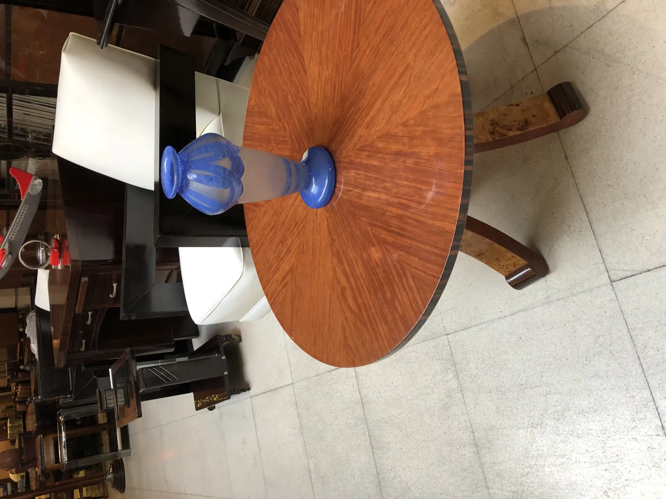 Antique signed glass Degué on a decorative table