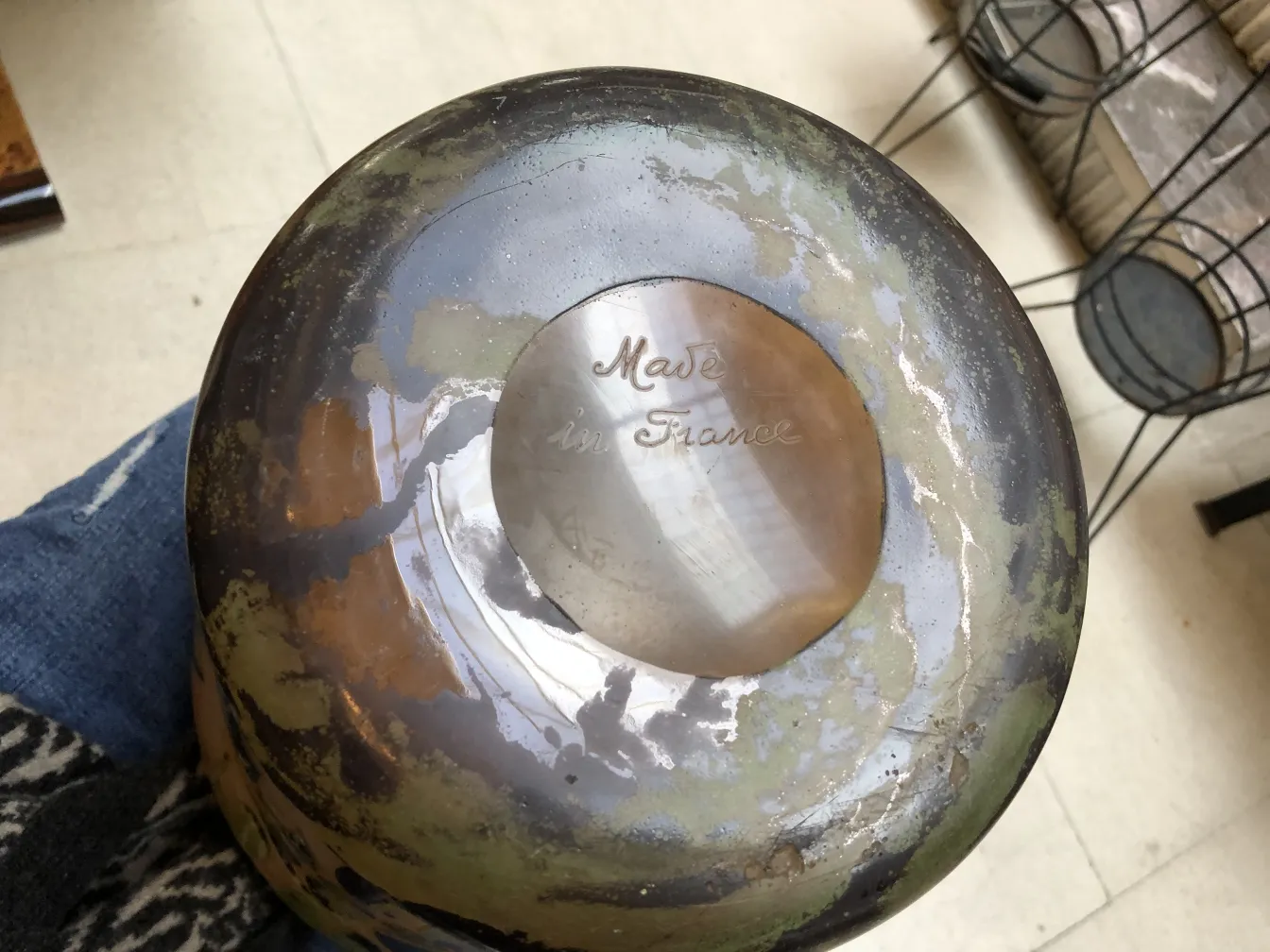 Bottom view of a signed Degué glass with unique details.