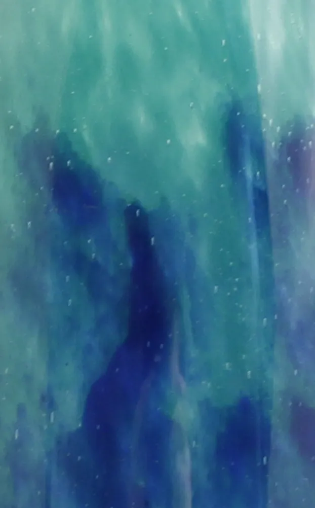 antique signed glasses in blue and green tones