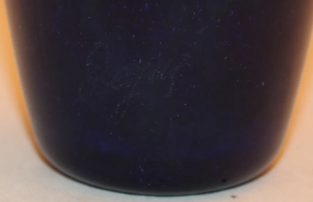 Antique signed glass Degué in dark blue tone with classic shape.
