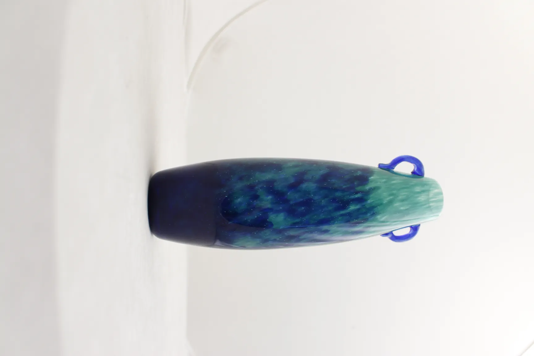 antique signed Degué glass showcasing blue and green tones with unique details