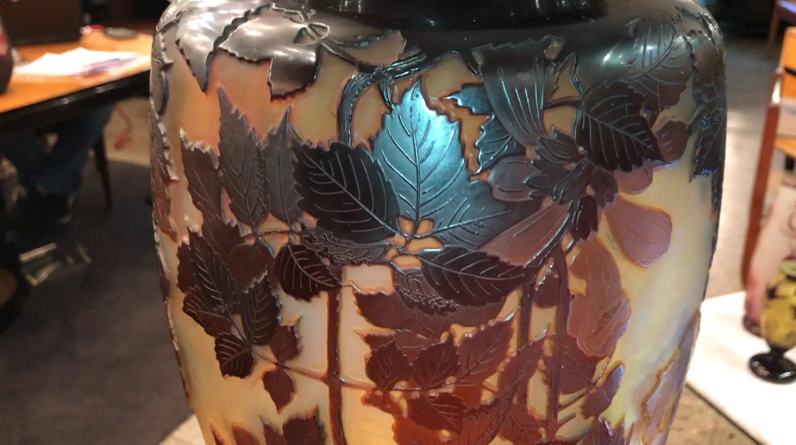 SIGNED GLASS Gallé with raised leaf engravings.