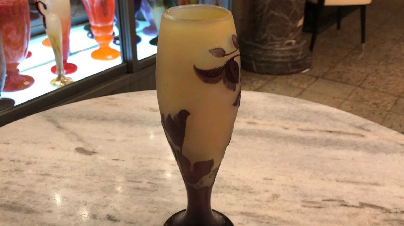 Antique glass with leaf design, elegant setting