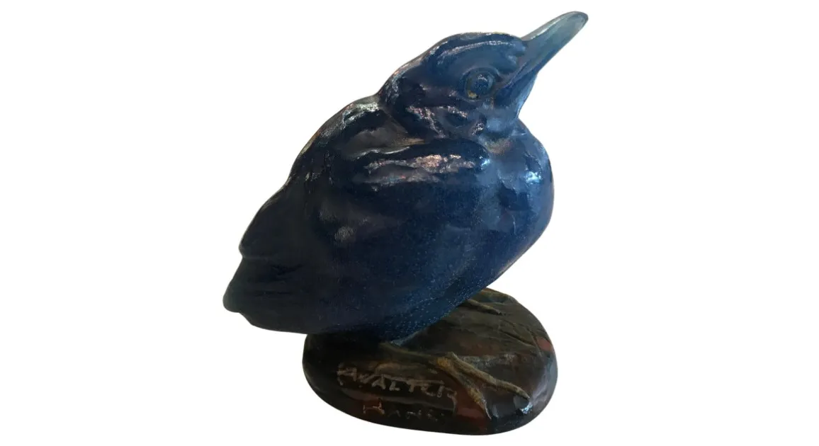 Signed glass bird, shiny blue finish, decorative base.