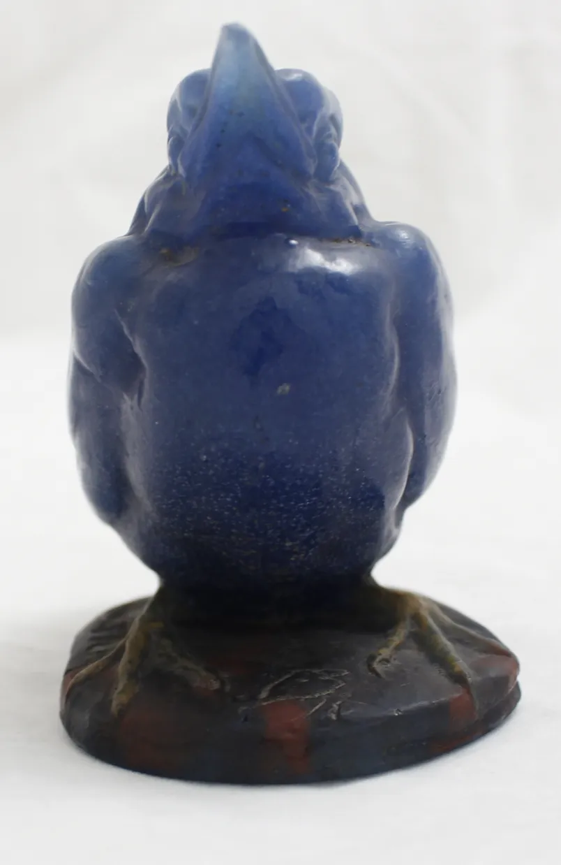 Sculpture antique en verre signé, couleur bleue, avec une base solide et des formes organiques.