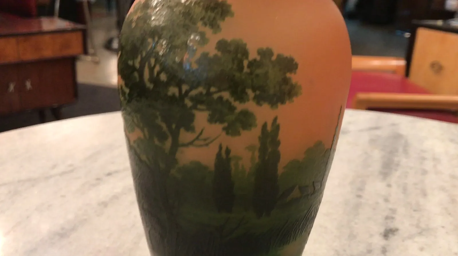 signed glass d'argental featuring a landscape with trees
