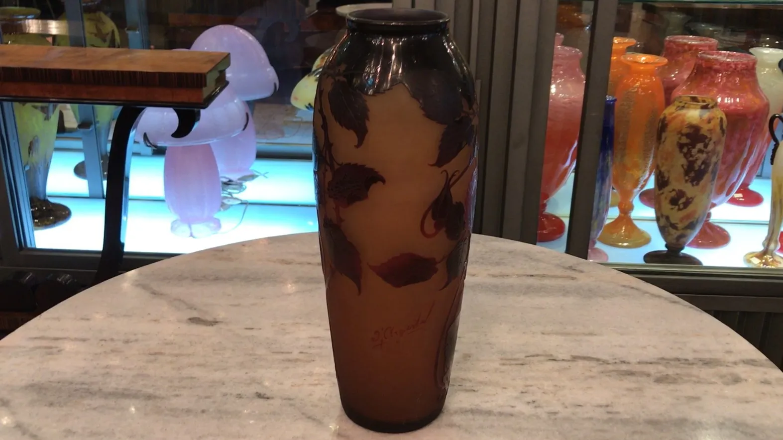 Antique signed glass D'Argental with leaf decoration, on display