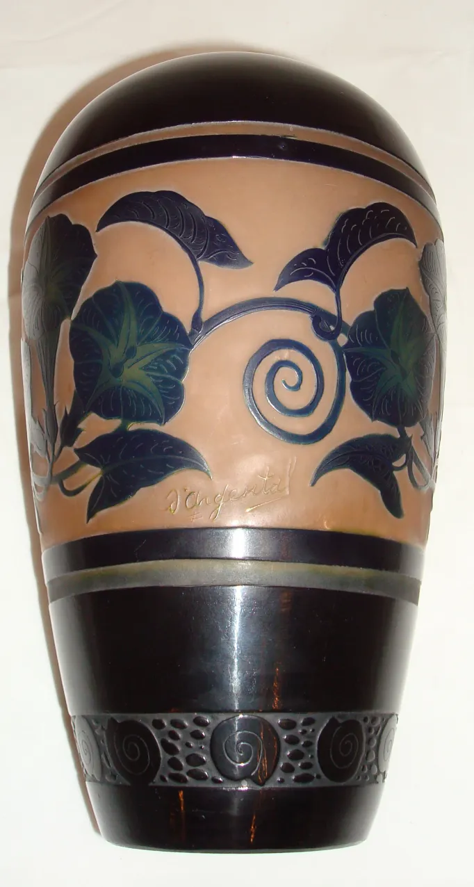 Antique piece with d'Argental signature, floral decorations on the surface.