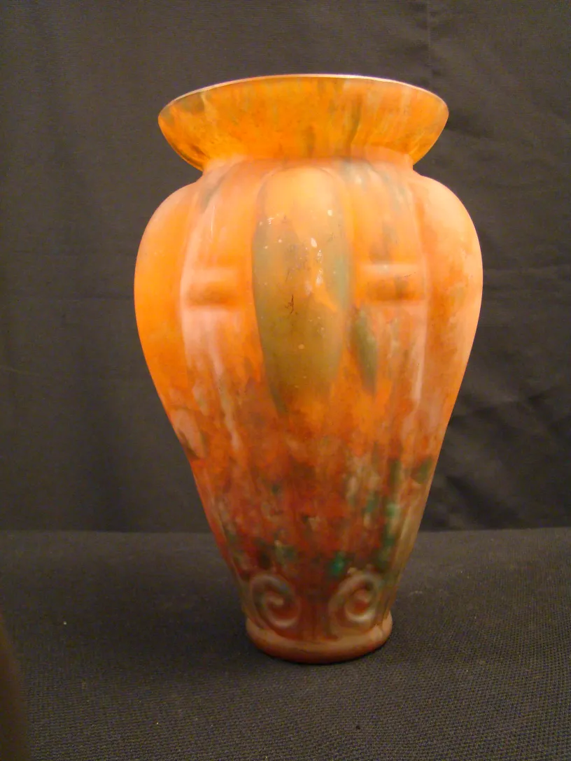vase with orange and green hues, antique.