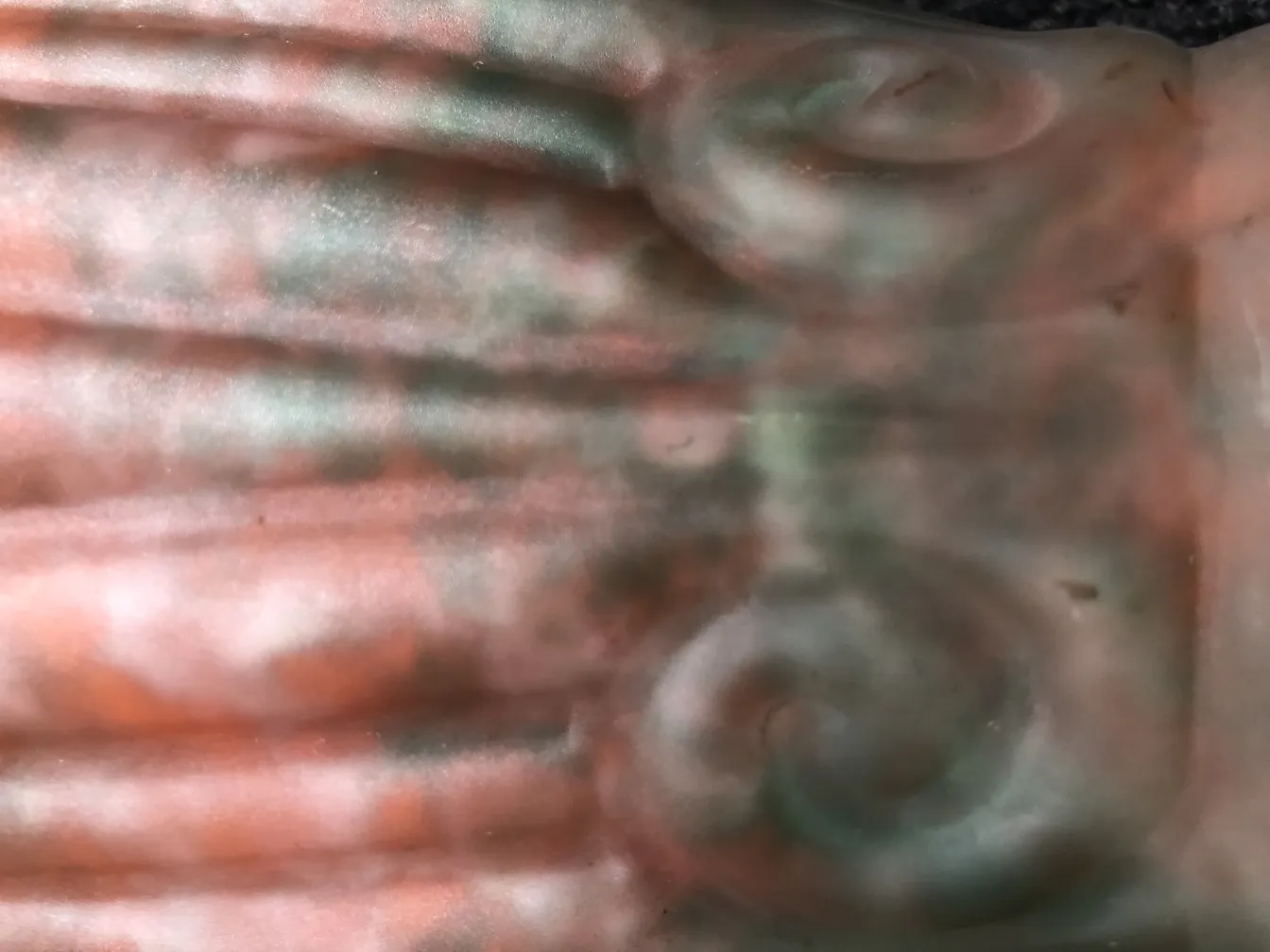 Detail of an antique piece featuring signed glass Lorrain