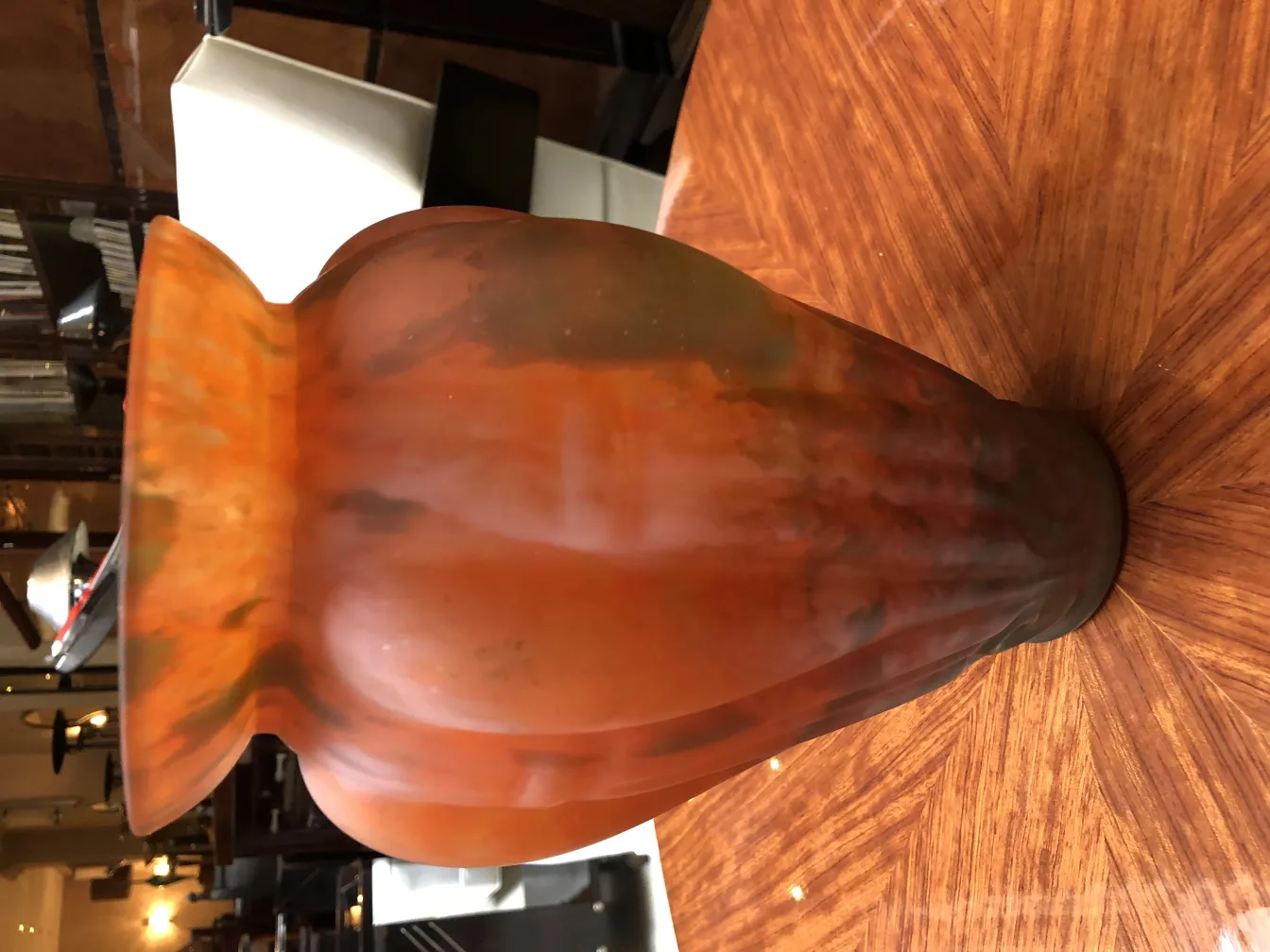 View of an antique signed glass Lorrain vase with warm colors and elegant shape.