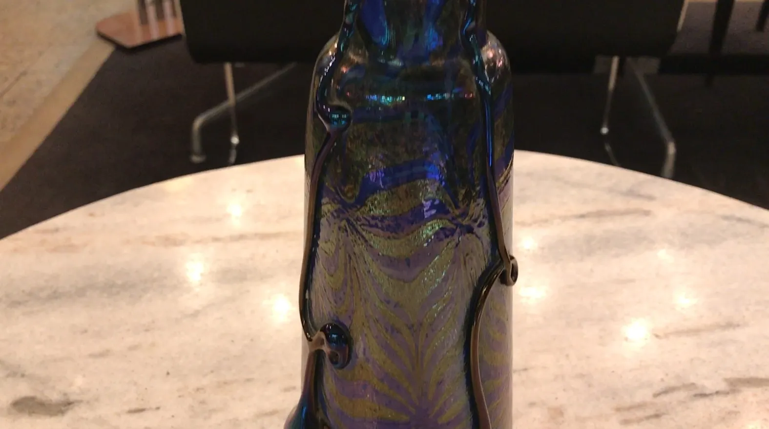 Antique signed glass Loetz bottle with vivid colors and decorative details