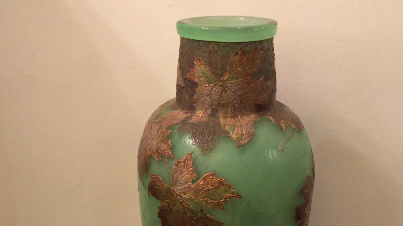 Glass vase signed LEGRAS with decorative green leaves
