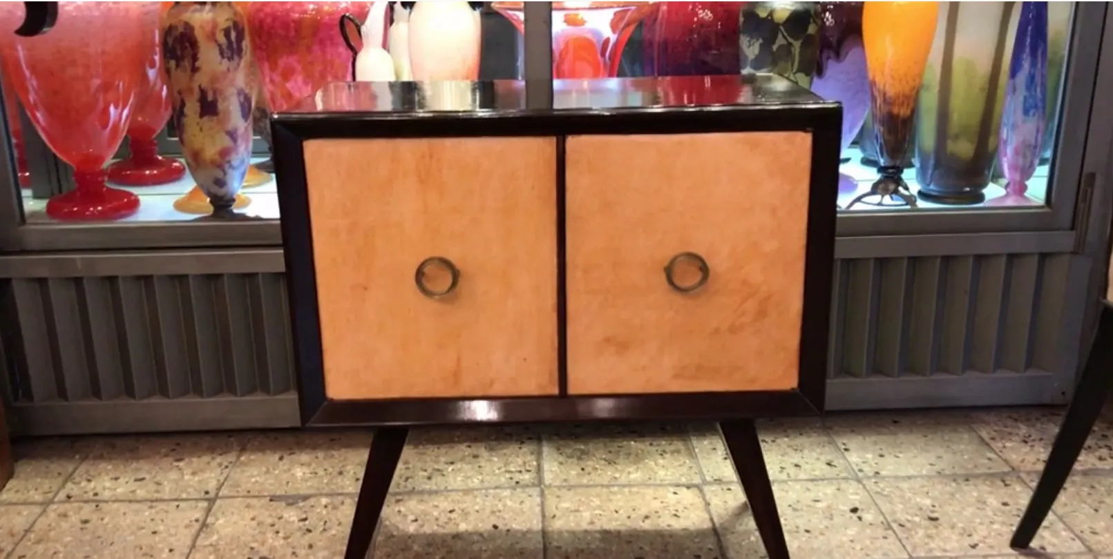 antique bedside table with doors and simple design