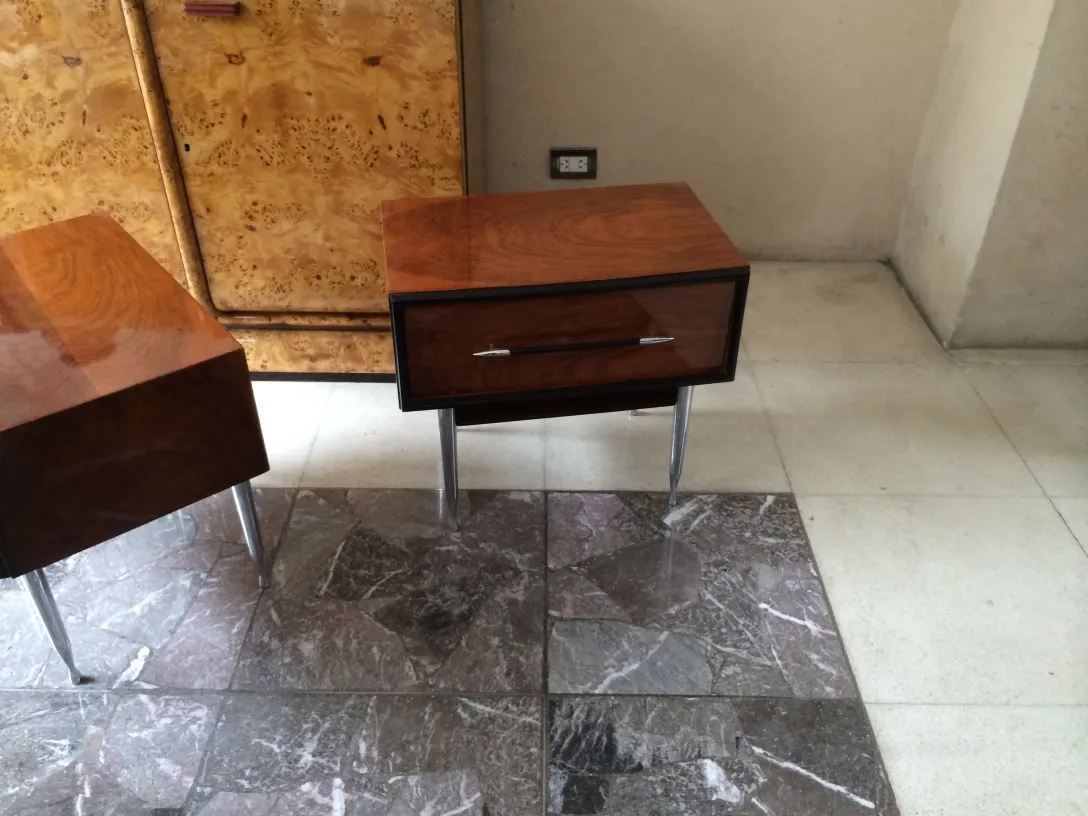 antique bedside tables with glossy finish and elegant details in a cozy setting