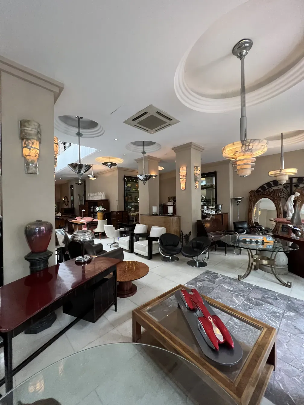 antique coffee table in an elegant living room with lights