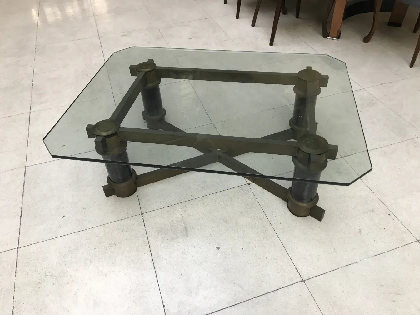 antique coffee table with glass top and artistic base