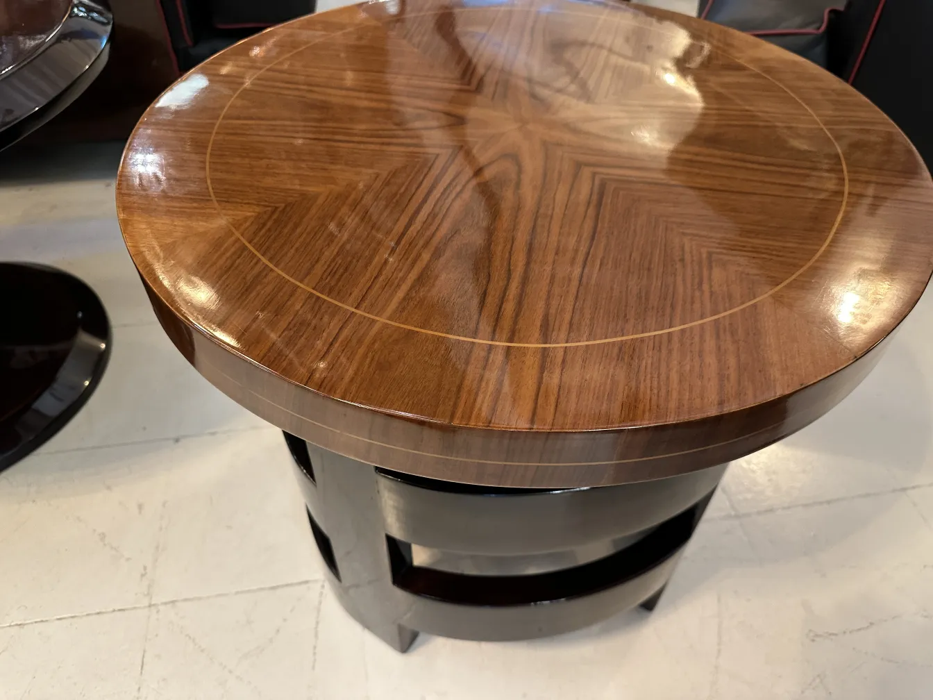 antique round table with a shiny surface and elegant design