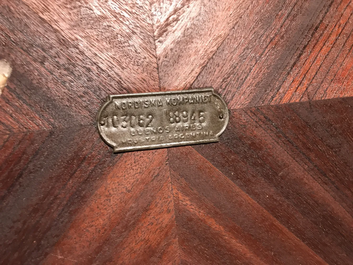 Antique small table featuring Nordiska Kompaniet label.