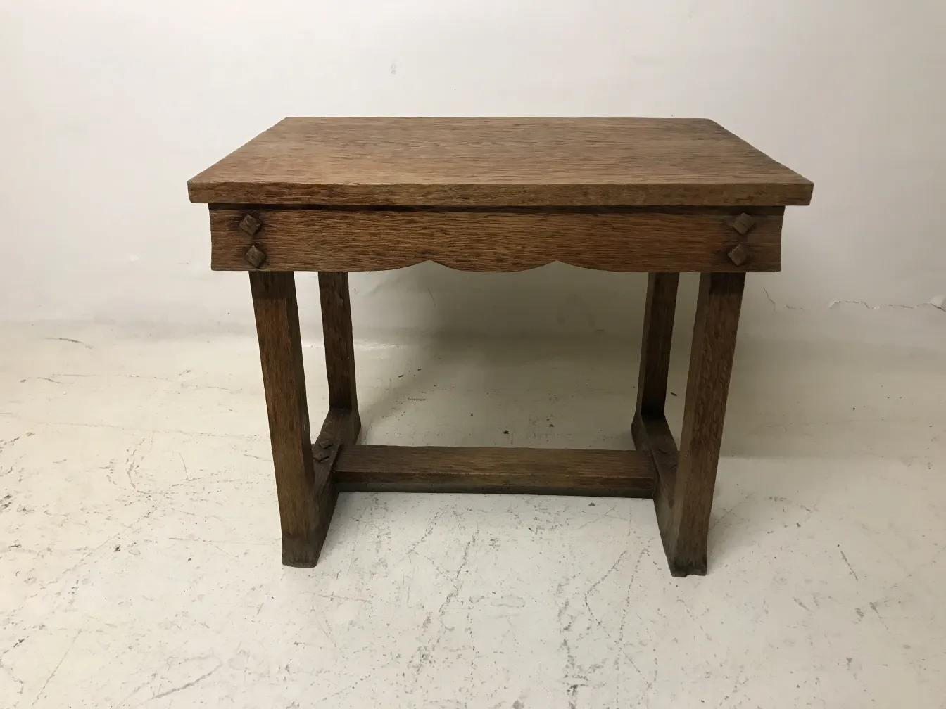 antique small table with rectangular shape and simple legs