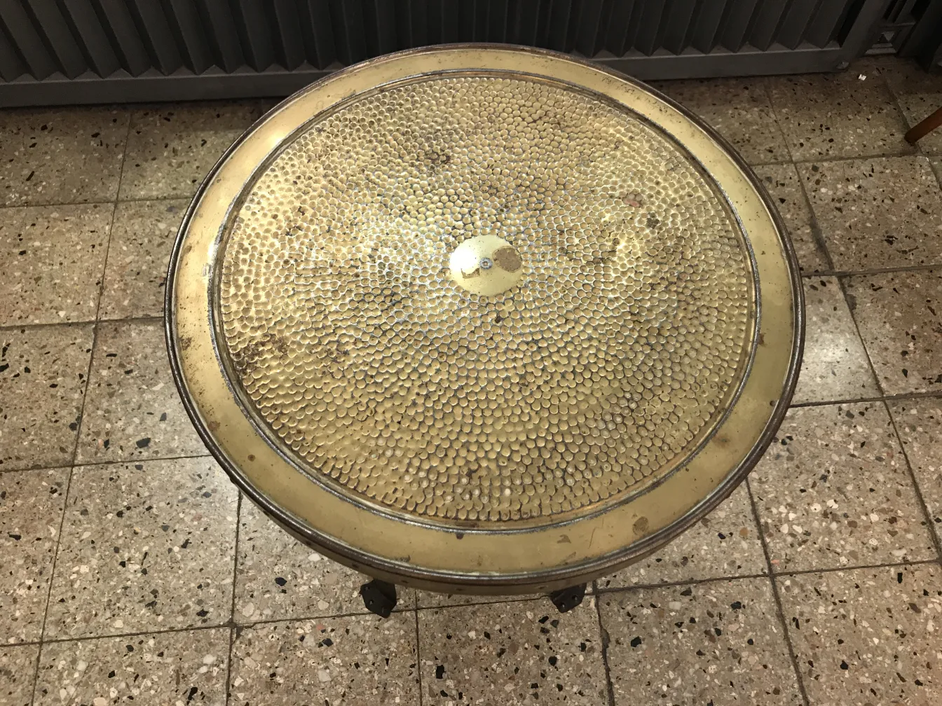 Antique round small table with decorative details, classic setting
