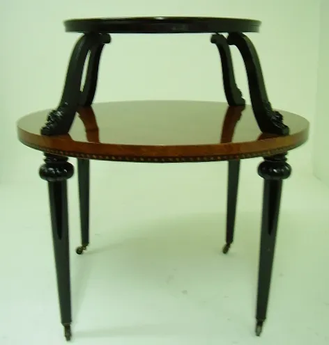 antique small table with stylish legs and two surfaces