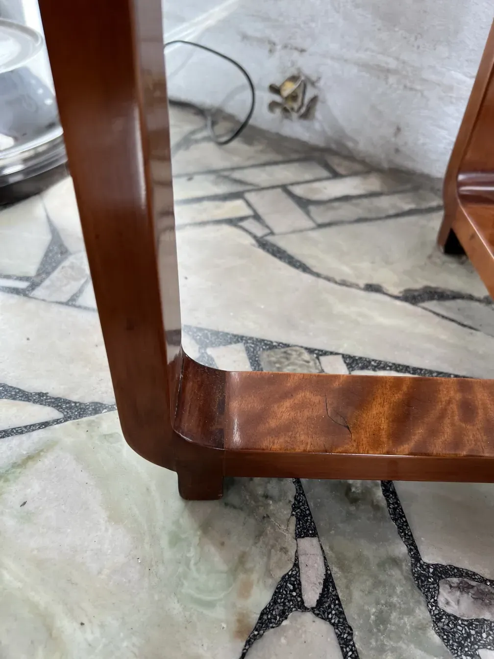 antique small table with unique design in an elegant setting