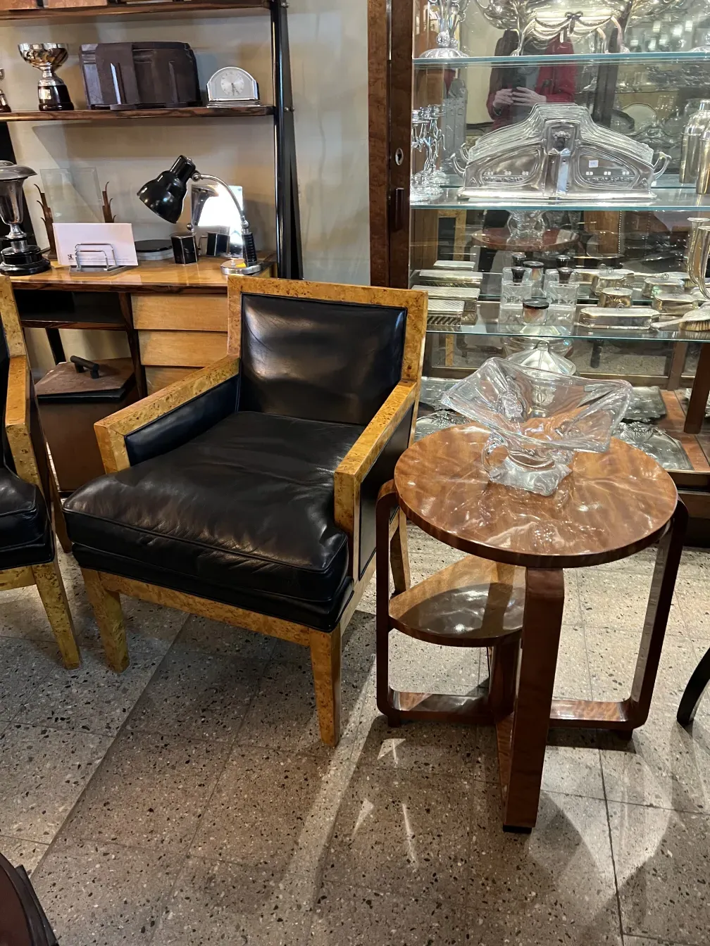 Antique small table with a round top and cozy atmosphere.