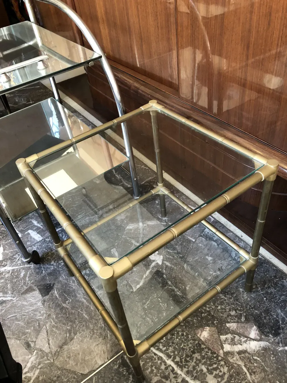 antique small table with glass surface and golden legs