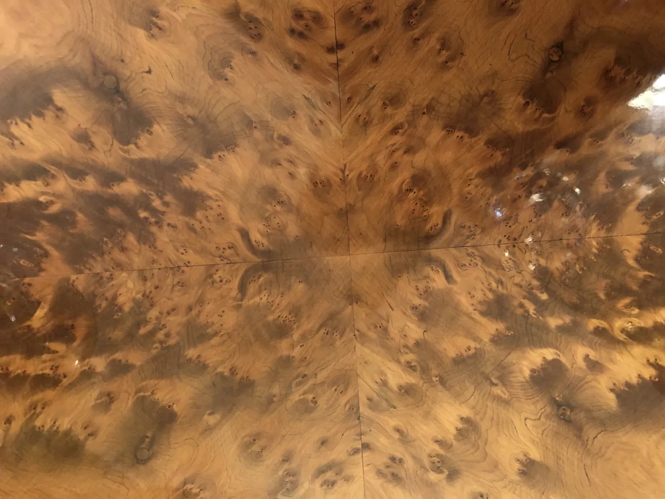 antique small table showing an elegant surface design