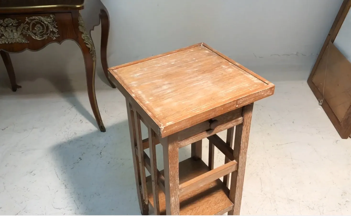antique small table with a simple design, perfect for reading