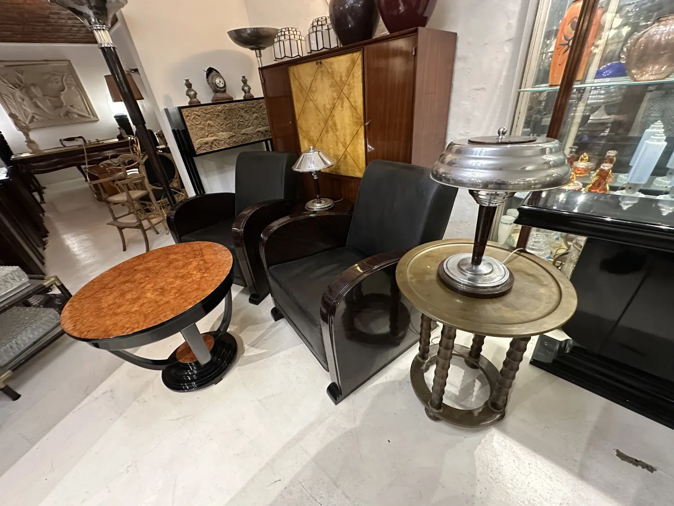 antique small round table with warm colored surface in a classic setting