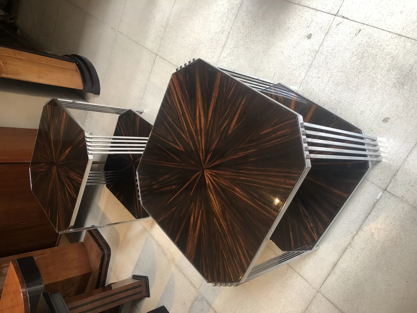 Two antique small tables with striking hexagonal designs