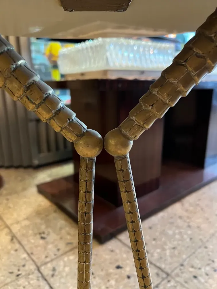 antique table with decorative legs and cozy setting