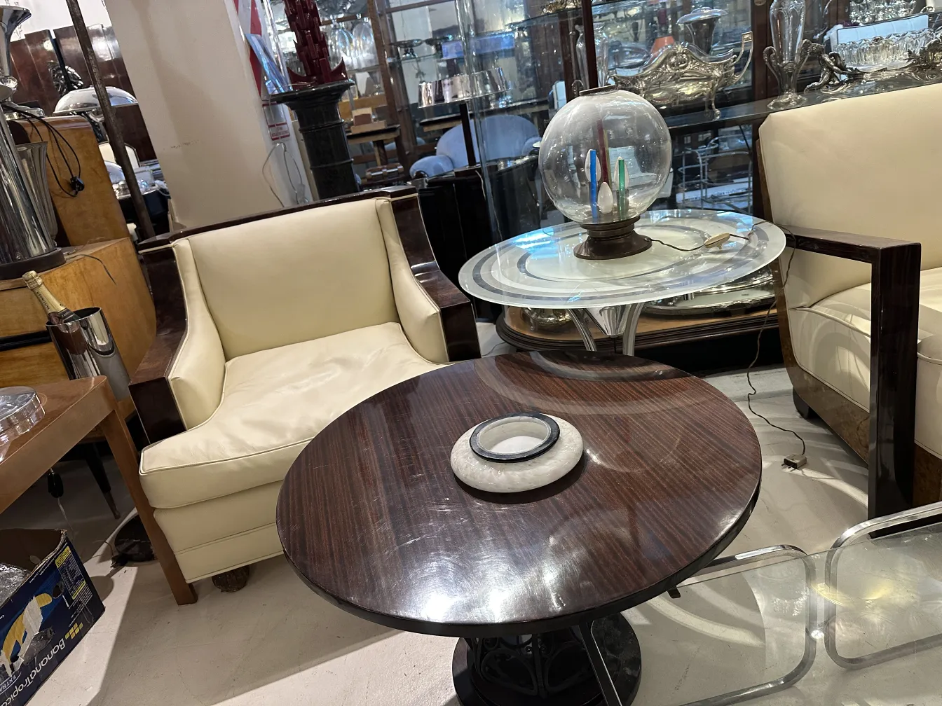Two antique decorative small tables in a stylish setting