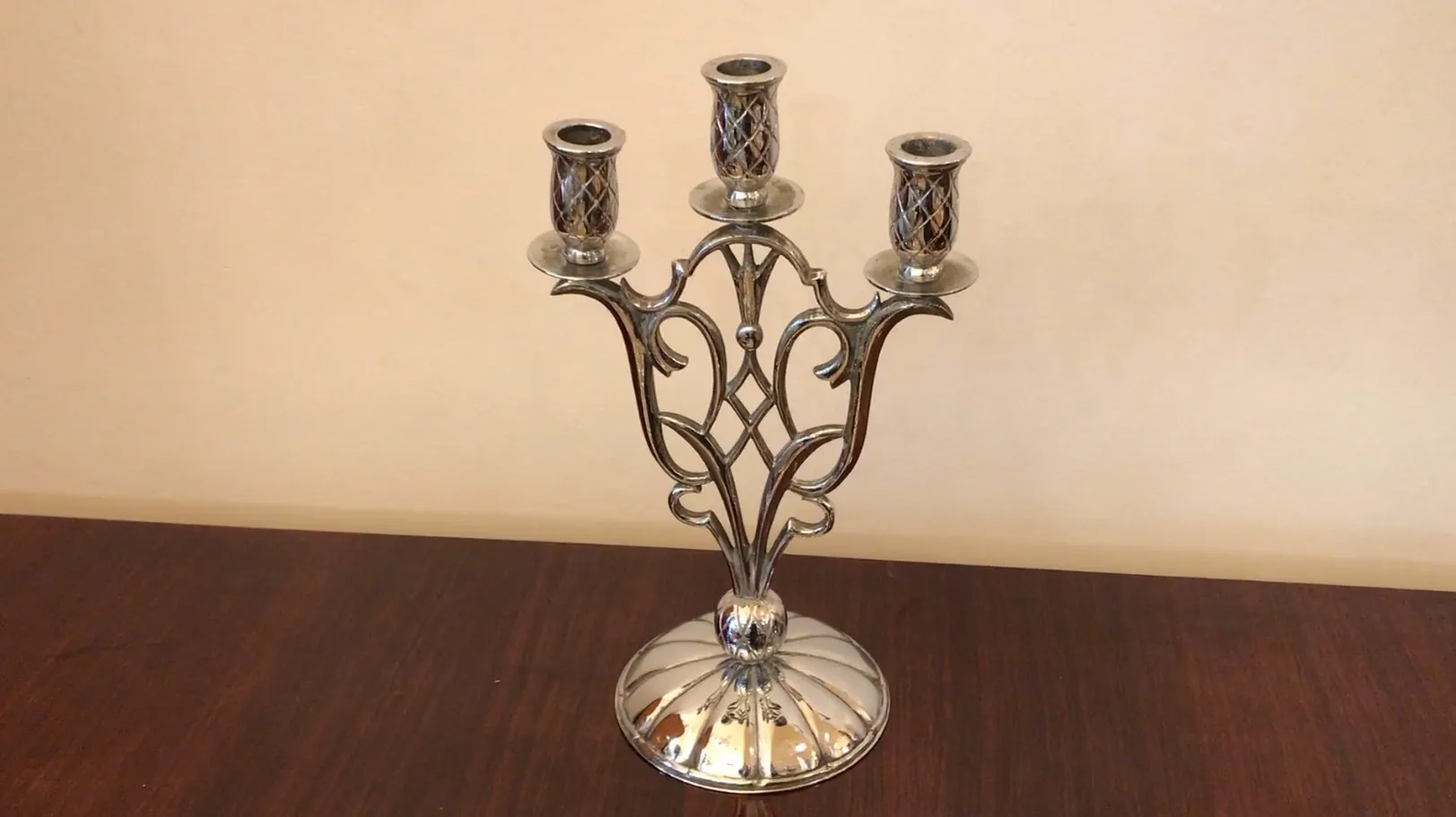 Antique candelabras art nouveau featuring elegant design and three arms.
