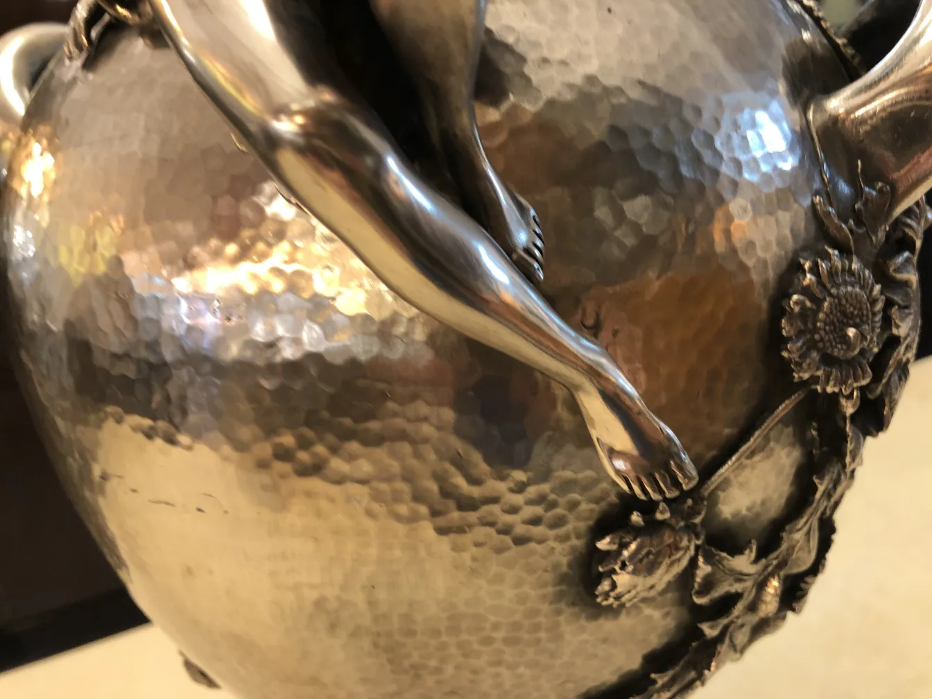 Side view of two antique vases Art Nouveau with floral decorations.