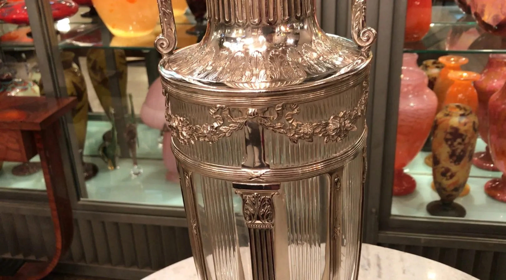 Two antique vases adorned with intricate engravings