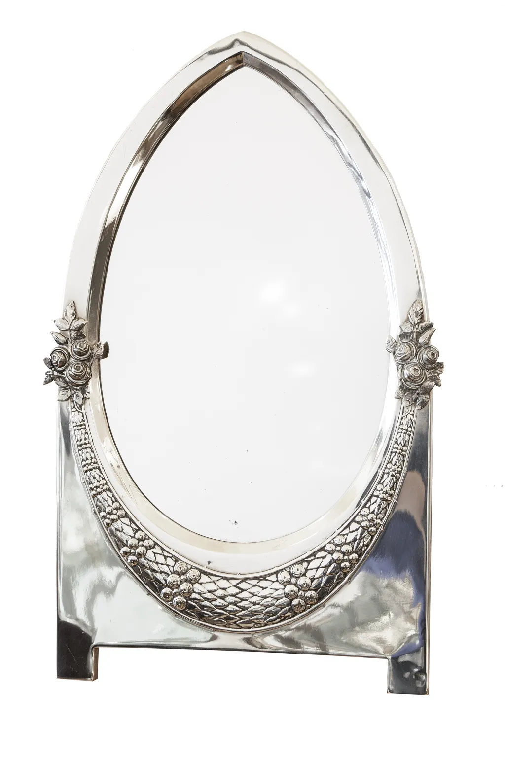 miroir ancien avec cadre décoratif et détails floraux