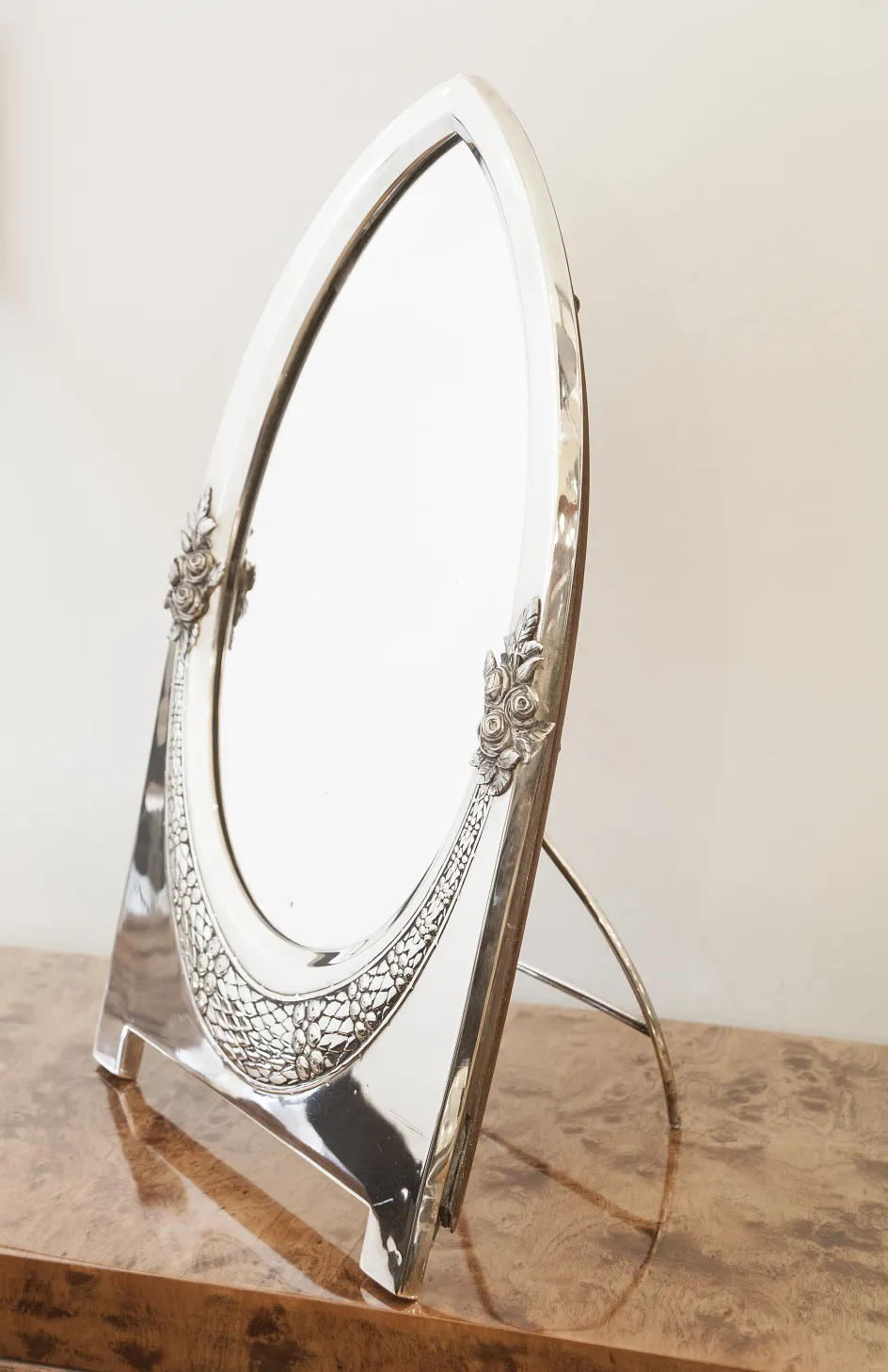 Antique mirror in Art Nouveau style with floral details