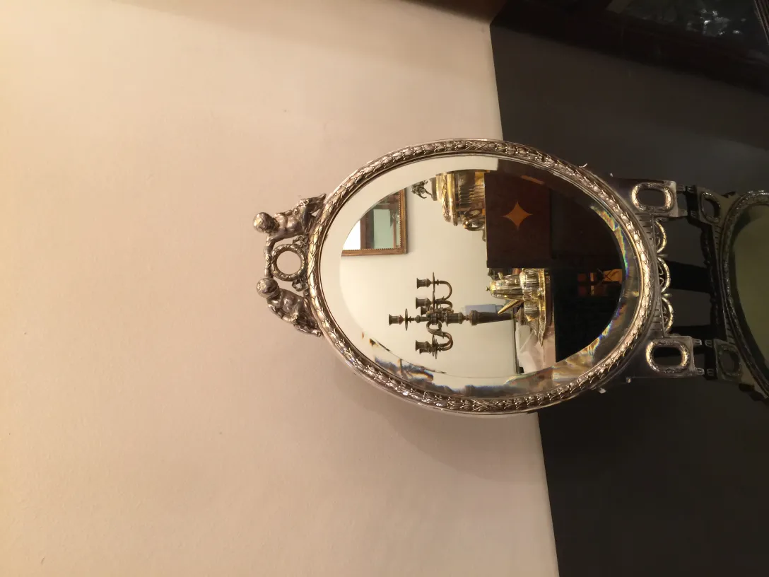 antique mirror with art nouveau design