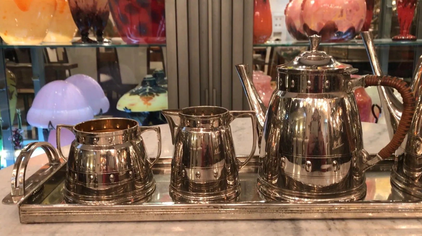 antique tea set WMF with shiny details on a tray