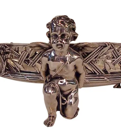 antique centerpiece Christofle featuring cherub design