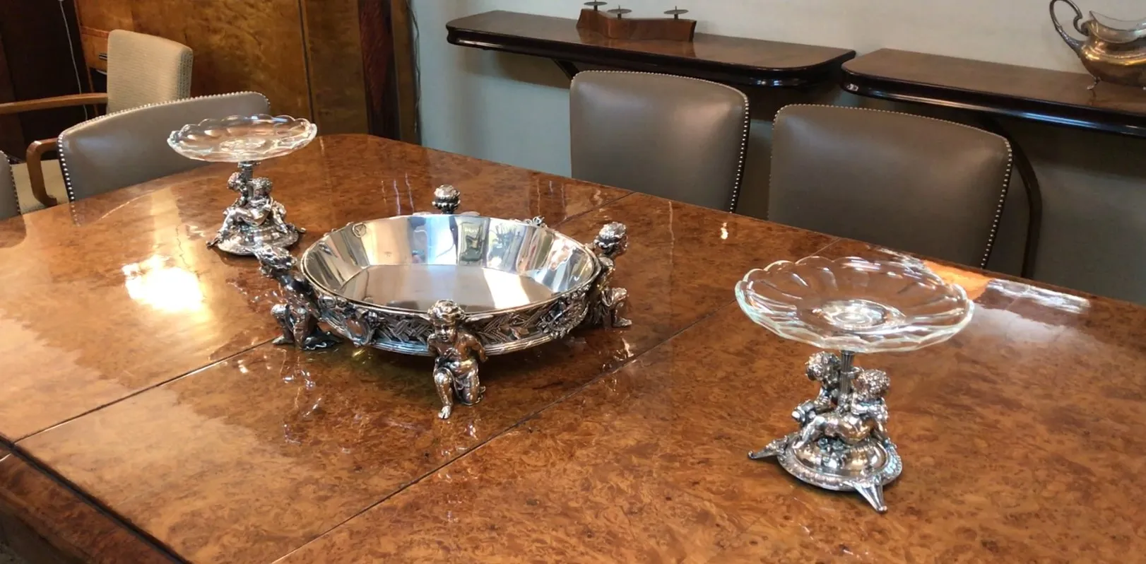 antique centerpiece christofle with decorative edges, surrounded by decor