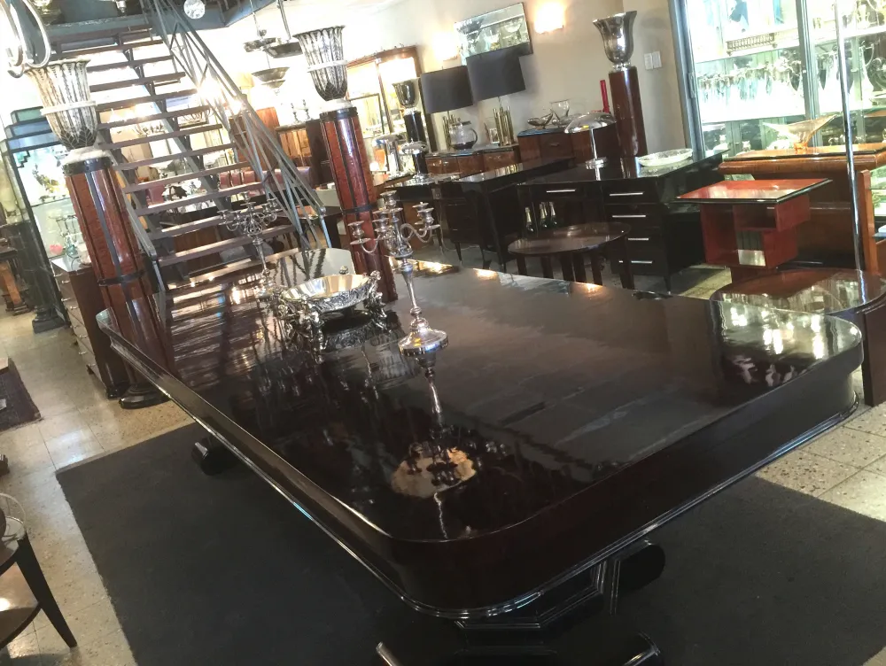 antique centerpiece Christofle in a stylish setting with tables and chairs